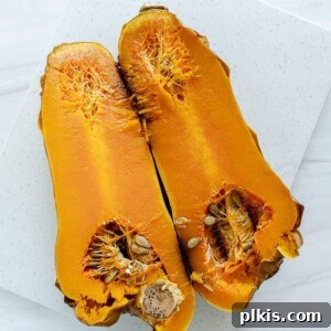 Roasted butternut squash, golden-brown and tender, ready for serving.