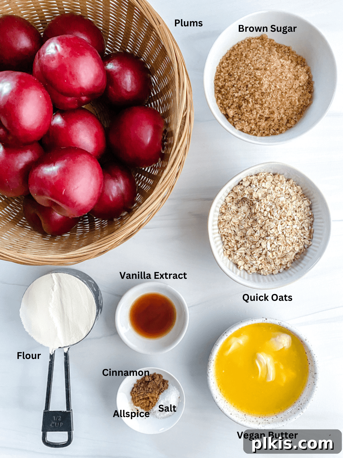 Homestyle Vegan Plum Crisp 3 Ingredients for Vegan Plum Crisp measured out on a white surface.