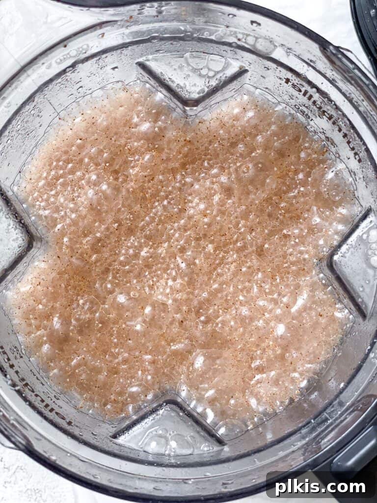 Plant-Based Horchata Delight 5 process shot of rice added to blender