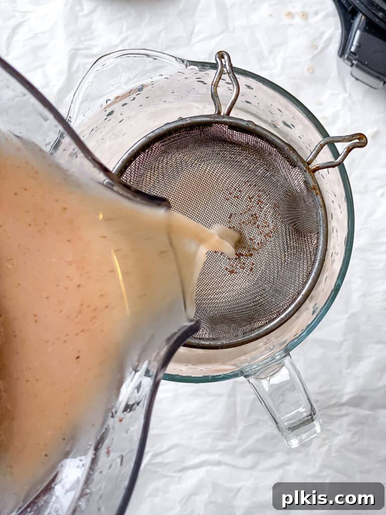 Plant-Based Horchata Delight 6 process shot of pouring rice milk into pitcher