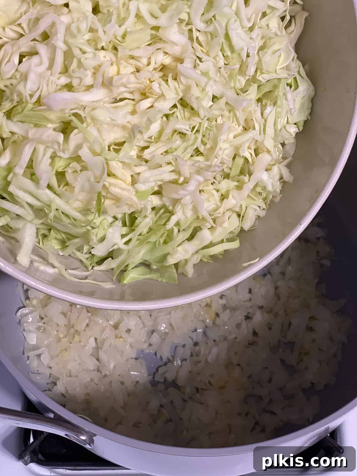 Zesty Plant-Based Hot and Sour Soup 5 process shot of adding cabbage to pan