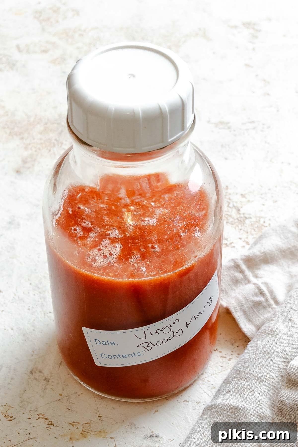 Alkolsüz Bloody Mary Tarifi 7 Virgin Bloody Mary mix stored in a glass bottle, ready for future enjoyment.