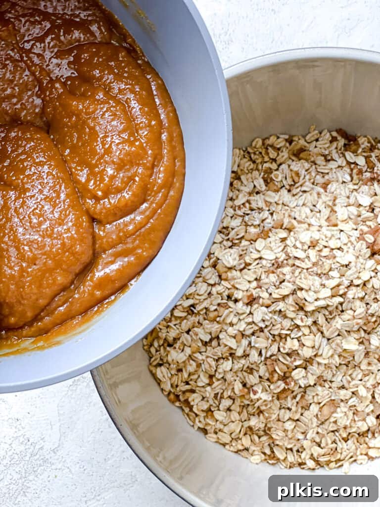 Simple Peanut Butter Granola Clusters 7 process shot of adding peanut butter mixture to oats
