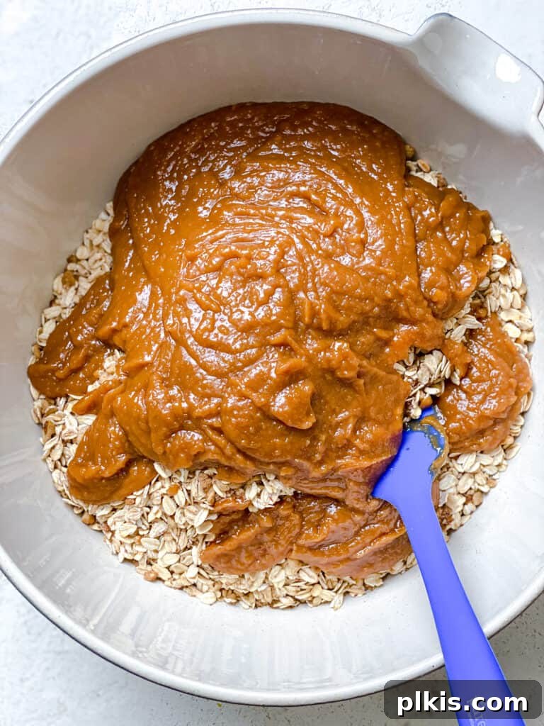 Simple Peanut Butter Granola Clusters 8 process shot of mixing ingredients together in a bowl
