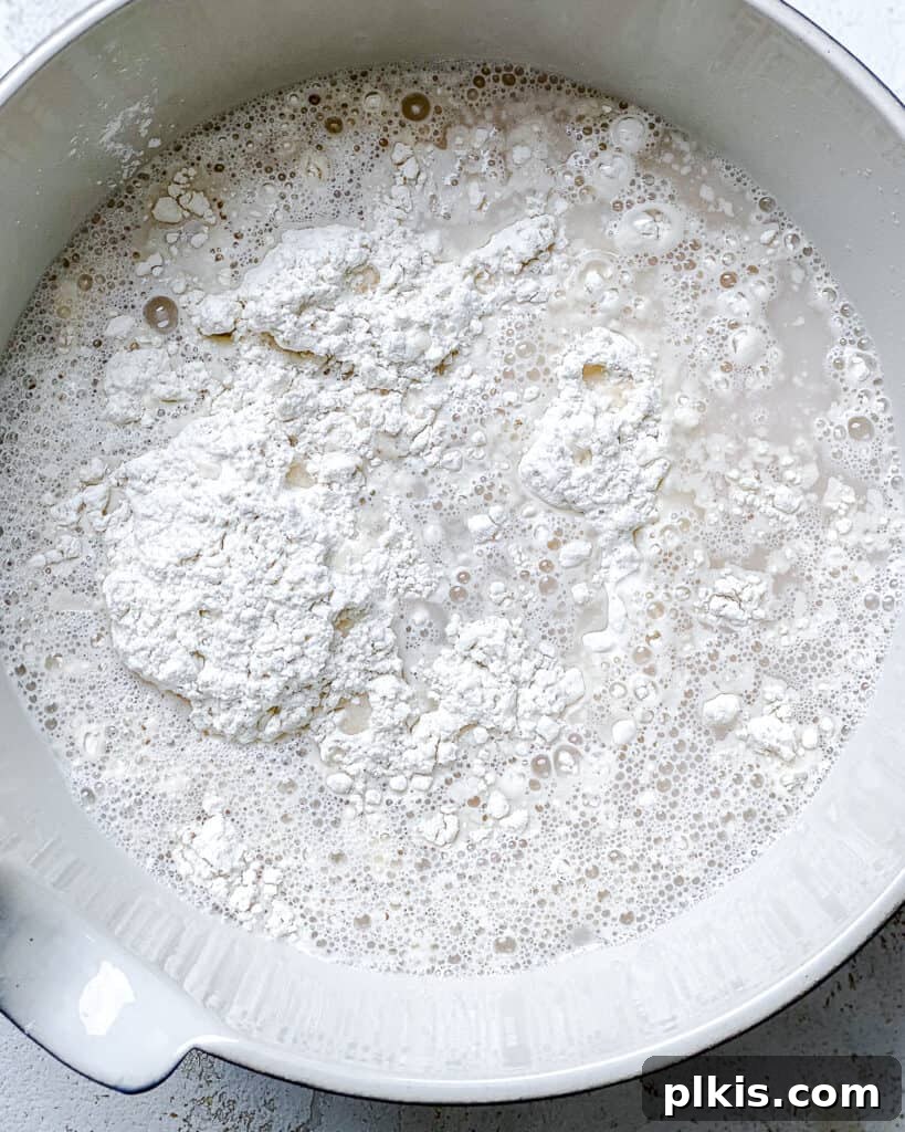 Lazy Baker's Crusty Loaf 7 process shot showing addition of water in bowl