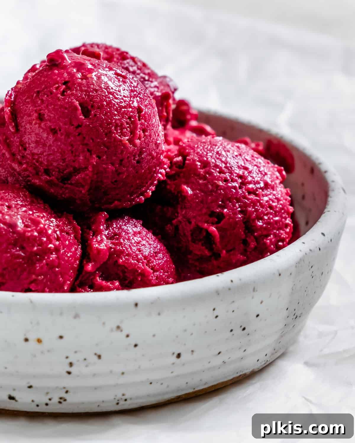 Instant Berry Tofu Nice Cream 6 A beautifully presented bowl of creamy 5-Minute Berry Tofu Ice Cream, ready to be enjoyed.