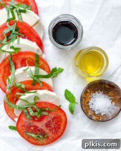 Plant-Based Caprese Delight 11 Tomatoes and tofu with seasoning and basil
