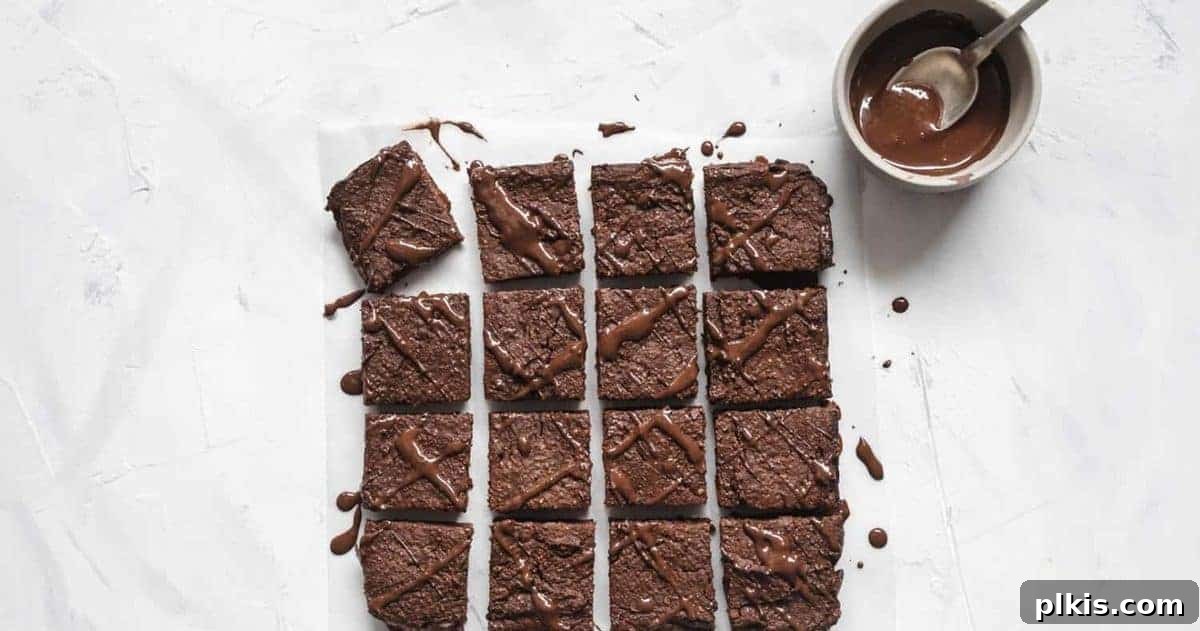20 Delicious Vegan Autumn Desserts 14 finished pumpkin chocolate brownies cut into pieces against a white background