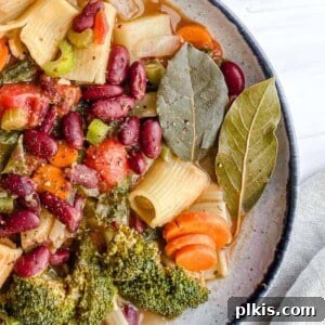 Hearty Vegan Minestrone 10 completed Vegan Minestrone Soup in a white bowl