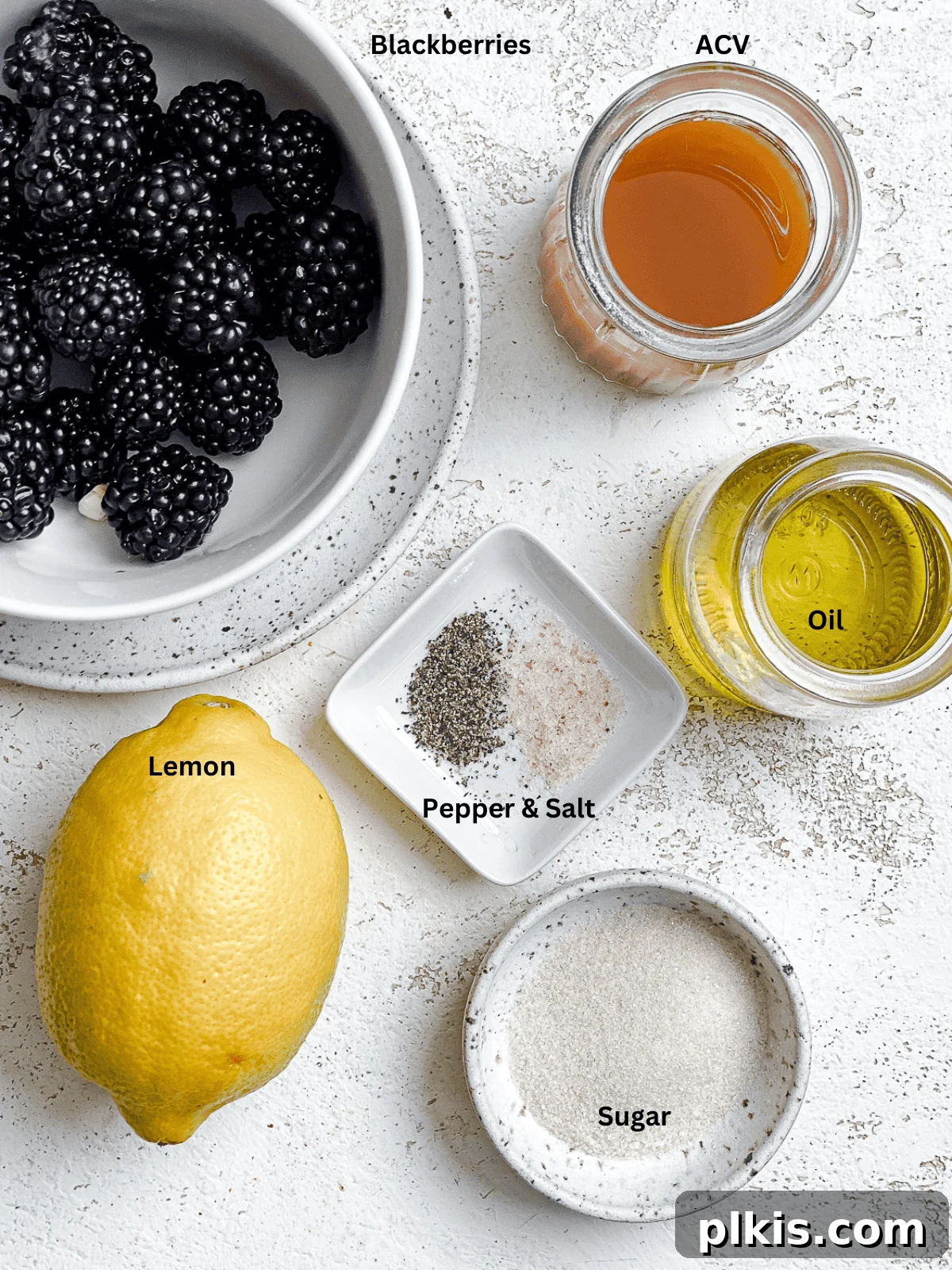 Effortless Blackberry Dressing 3 Ingredients for 5-Minute Blackberry Vinaigrette on a white surface,