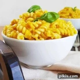 finished vegan pumpkin pasta in a white bowl