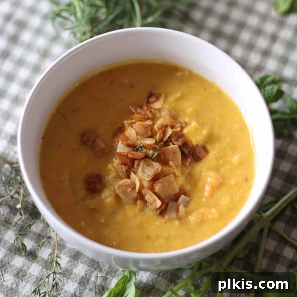 45 Mouthwatering Vegan Thanksgiving Recipes 8 A cozy bowl of finished squash soup, perfectly warm and inviting.