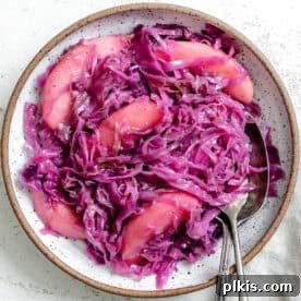 45 Mouthwatering Vegan Thanksgiving Recipes 30 Completed German Red Cabbage (Rotkohl) served in a bowl.