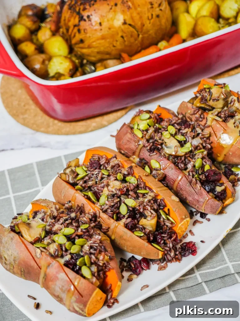 45 Mouthwatering Vegan Thanksgiving Recipes 49 A tray of finished vegan loaded sweet potatoes, garnished and ready to serve.