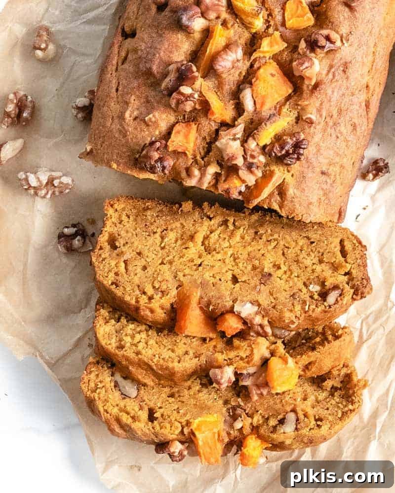 45 Mouthwatering Vegan Thanksgiving Recipes 66 Completed sliced vegan pumpkin bread, showcasing its moist texture and rich color.
