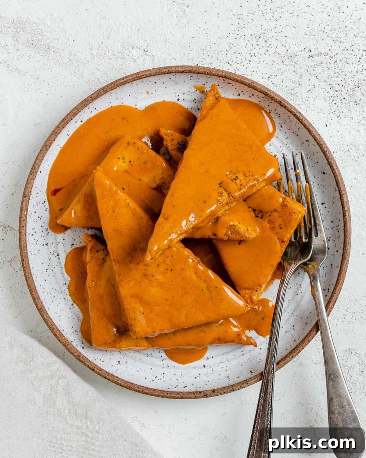 Buffalo Tofu Your Way: Easy Fried, Baked, or Air-Fried 13 Plated Easy Buffalo Tofu with a fresh garnish, ready to be served