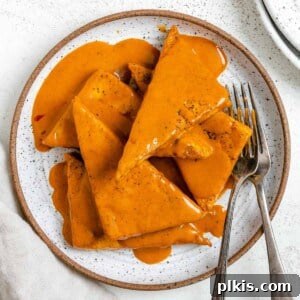 Completed Easy Buffalo Tofu plated on a white plate