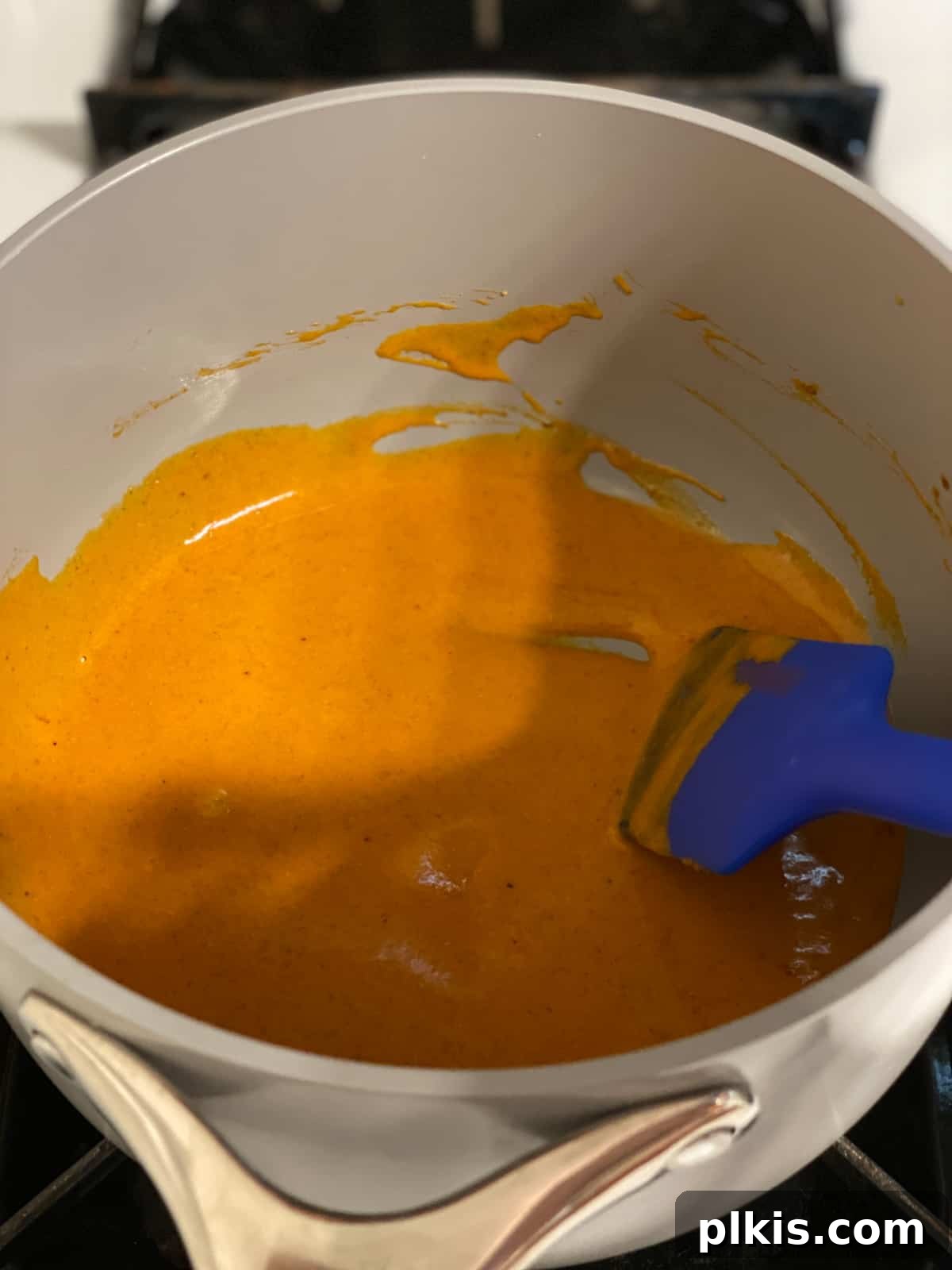 Buffalo Tofu Your Way: Easy Fried, Baked, or Air-Fried 9 Process shot of mixing the buffalo sauce ingredients together in the pan