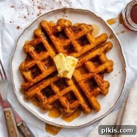 Completed Vegan Pumpkin Waffles on a plate.