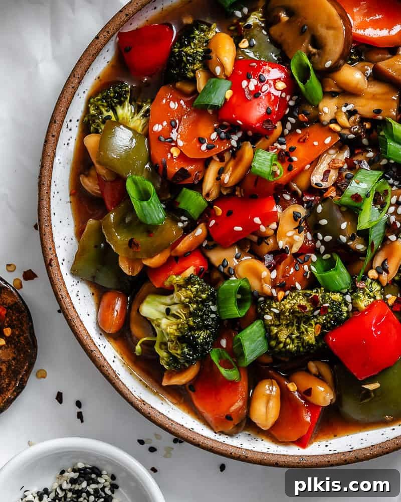 Spicy Kung Pao Vegetable Stir-fry 2 Completed Kung Pao Vegetables on a plate.