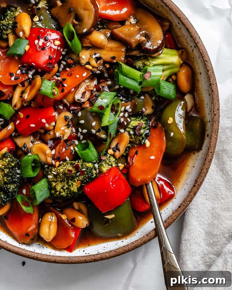 Spicy Kung Pao Vegetable Stir-fry 9 Completed Kung Pao Vegetables on a plate.