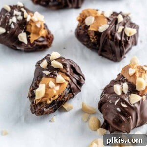 Peanut Butter Date Delights 13 four completed peanut butter stuffed dates on a white surface