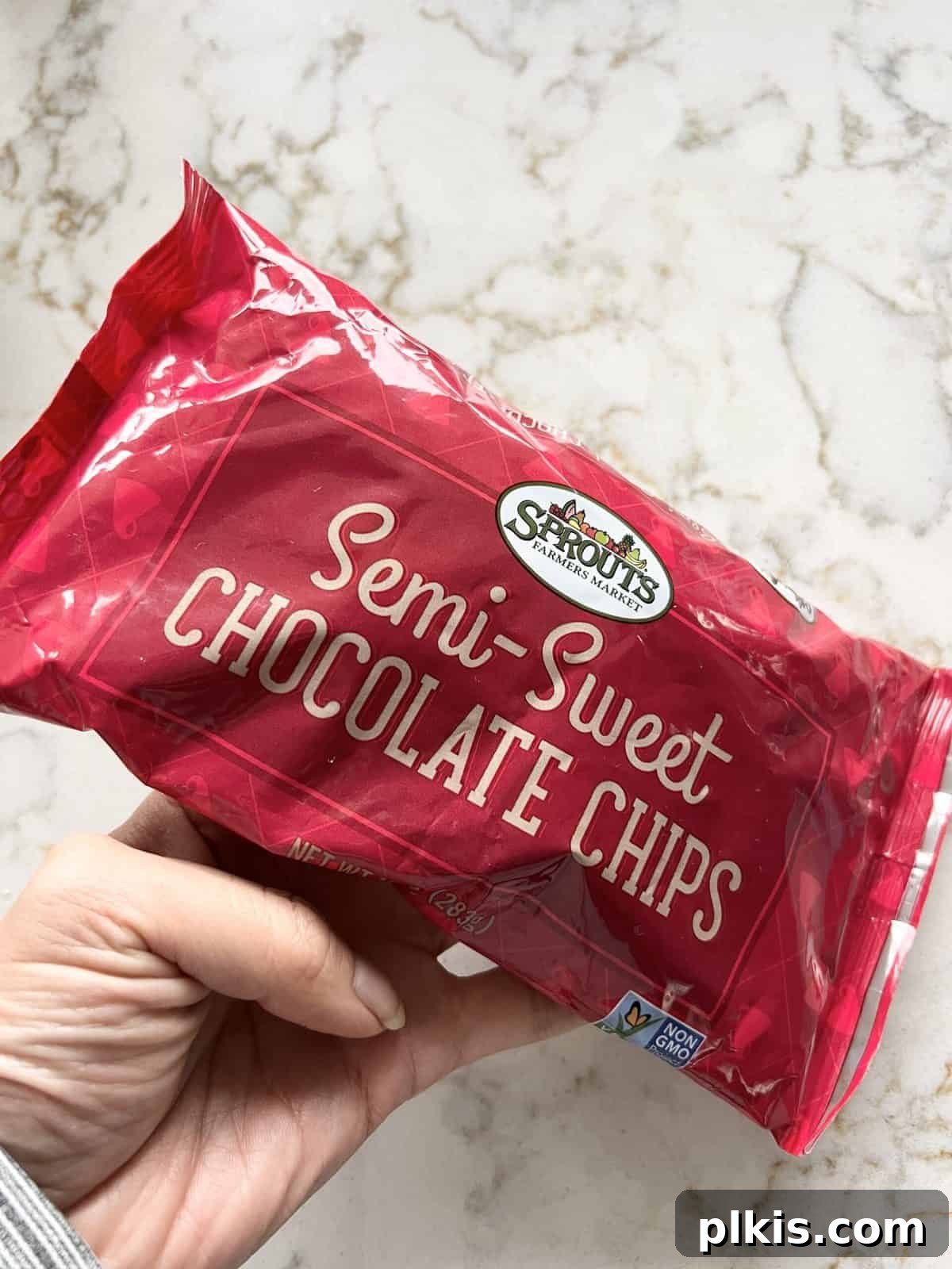 Peanut Butter Date Delights 3 close-up of semi-sweet vegan chocolate chips in red packaging against a white background