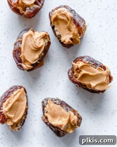 Peanut Butter Date Delights 8 a series of dates being filled with peanut butter, showcasing the process