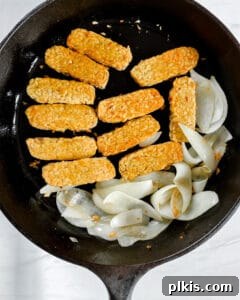 Sweet & Smoky Tempeh BBQ 9 Process showing cooking tempeh and onion on a pan