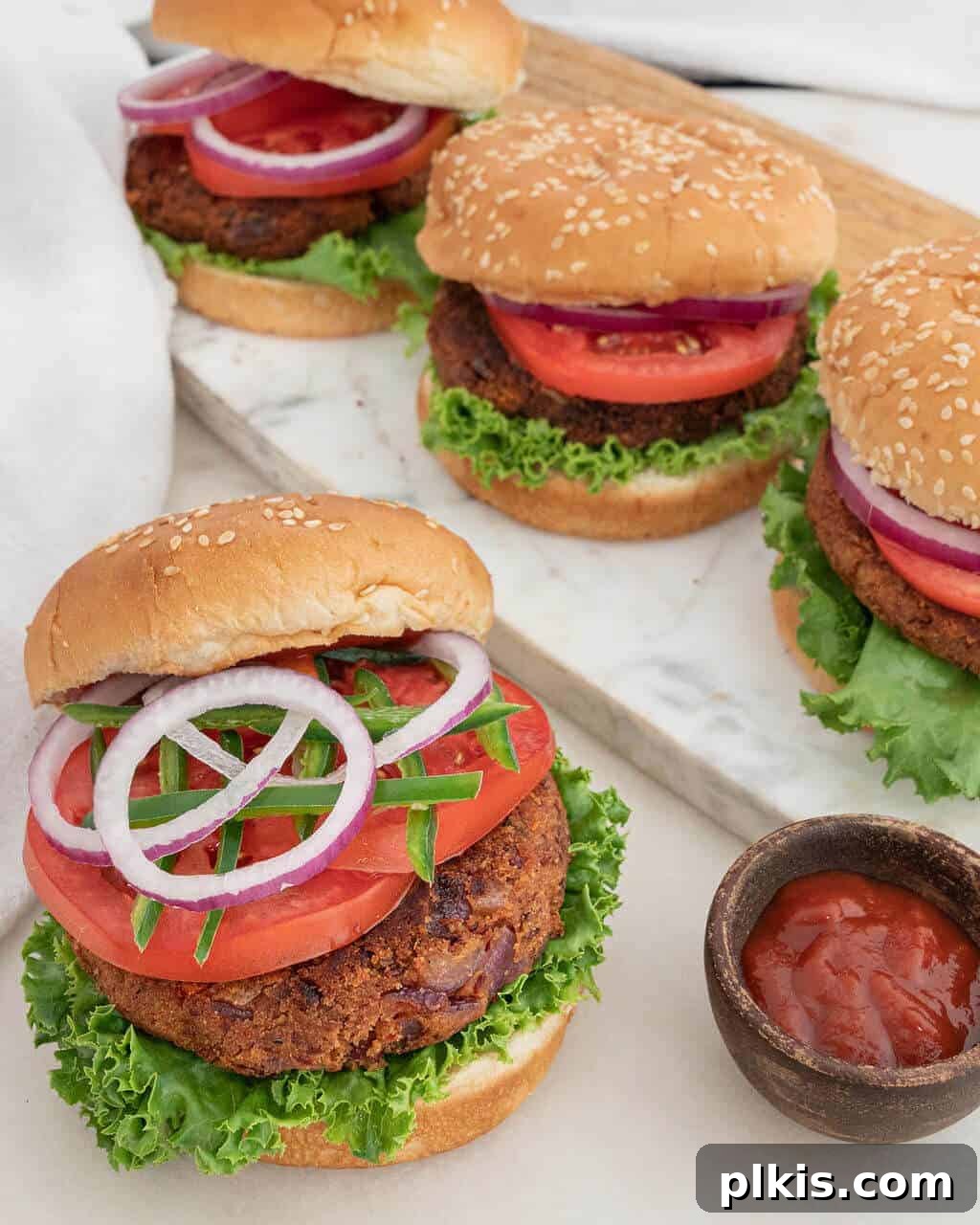 Spicy Azuki Bean Burger 2 Spicy Red Bean Burgers on buns loaded with all the fresh toppings.