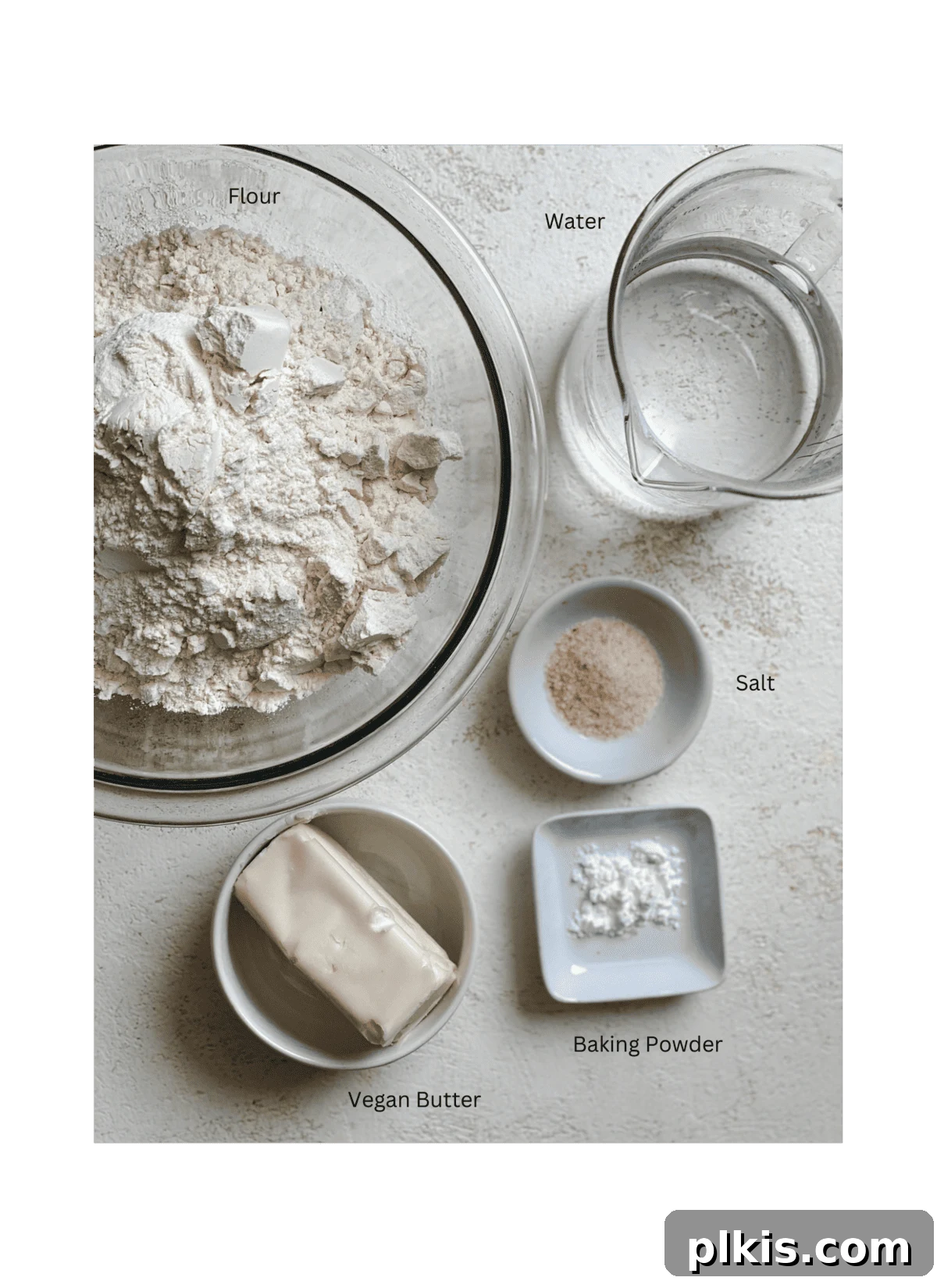 Handcrafted Flour Tortillas 3 Ingredients for Tortillas de Harina – Handmade Flour Tortillas neatly arranged against a white surface, ready for mixing.