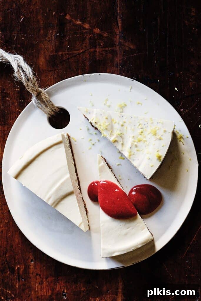 35 Irresistible Vegan Cake Creations 4 A luscious classic vegan cheesecake adorned with vibrant strawberry sauce, with three perfectly plated slices ready to be savored on a white plate.
