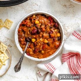 Over 30 Quick and Flavorful Vegan Instant Pot Recipes 16 Completed Easy Vegan Chili (With Roasted Bell Peppers) in a bowl.