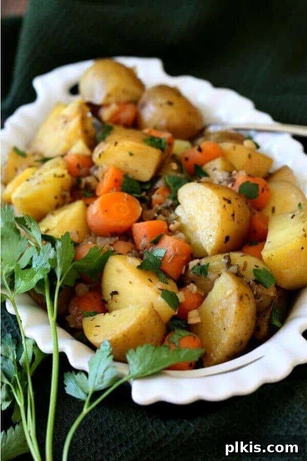 Over 30 Quick and Flavorful Vegan Instant Pot Recipes 36 completed carrot medley in a white serving platter against a dark background