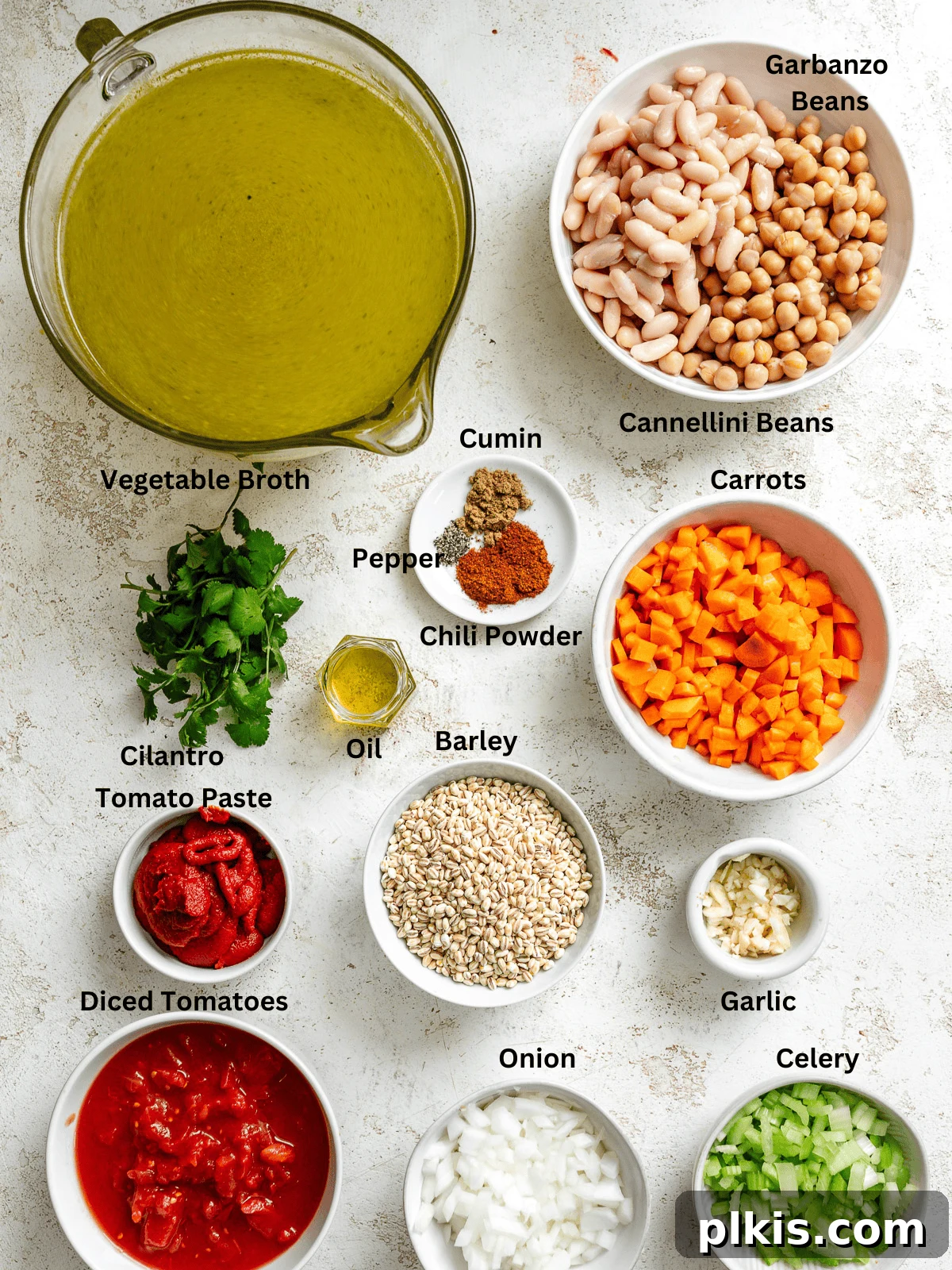 Hearty Barley and Bean Stew 3 Ingredients for Barley and Bean Soup measured out on a white surface.