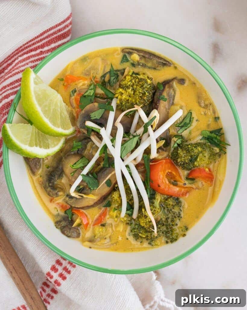 Quick & Delicious: 30-Minute Vegan Dinners 18 Coconut Bean Sprout Curry in a bowl against a light background.