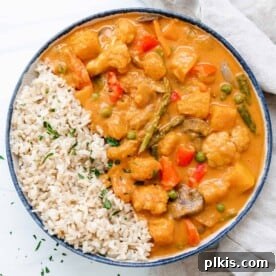 A delicious bowl of butternut squash curry with rice.