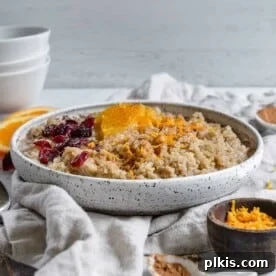 A bowl of cinnamon orange quinoa porridge, warm and inviting.