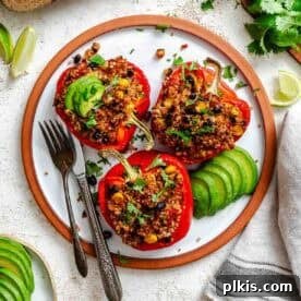 Quinoa Stuffed Bell Peppers, beautifully plated.
