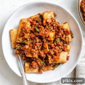 A plate of Vegan Lentil Bolognese, rich and hearty.