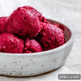 A bowl of creamy 5-Minute Berry Tofu Ice Cream.