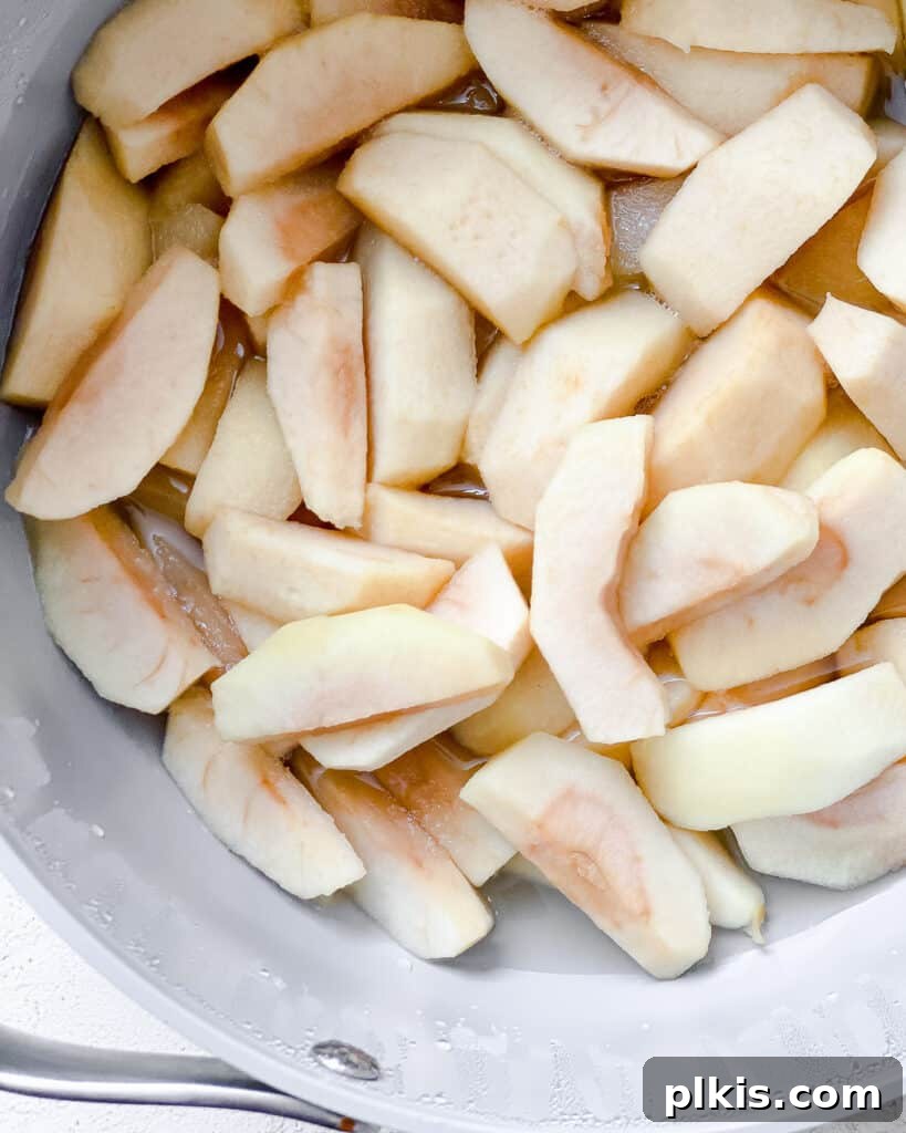 Blush Berry Apple Puree 6 sliced apples with addition of ingredients in a bowl