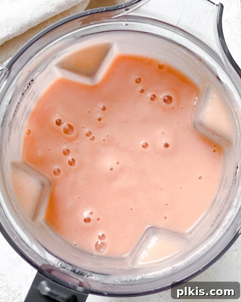 Blush Berry Apple Puree 9 process shot showing post blended strawberries and apples