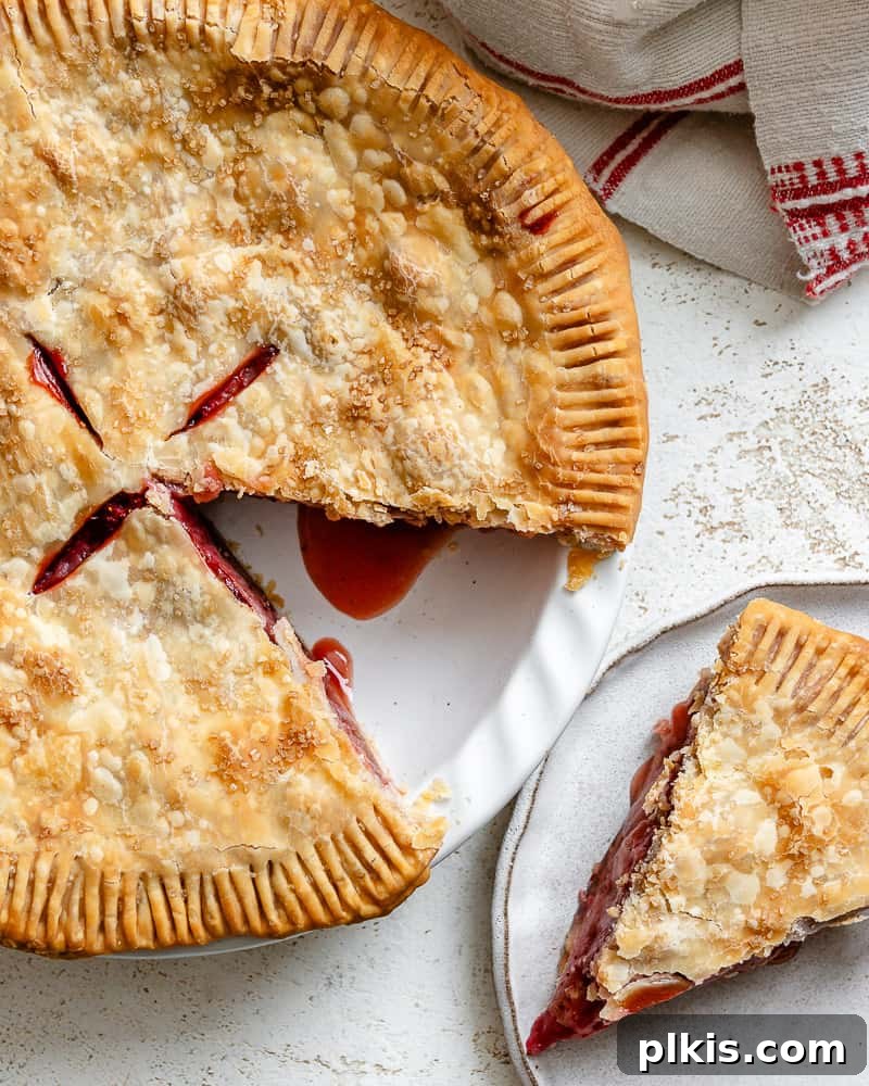 Luscious Vegan Strawberry Pie 10 Completed Easy Strawberry Pie on a white surface, showcasing the golden crust