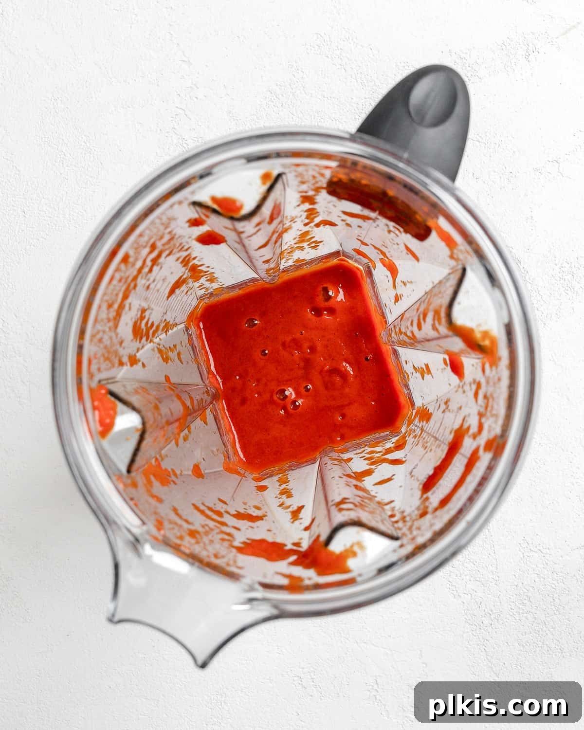 Turkish Embered Pepper Tomato Soup 6 Process shot displaying the beautifully smooth and vibrant red pepper puree inside a blender after processing, ready to be incorporated into the soup.