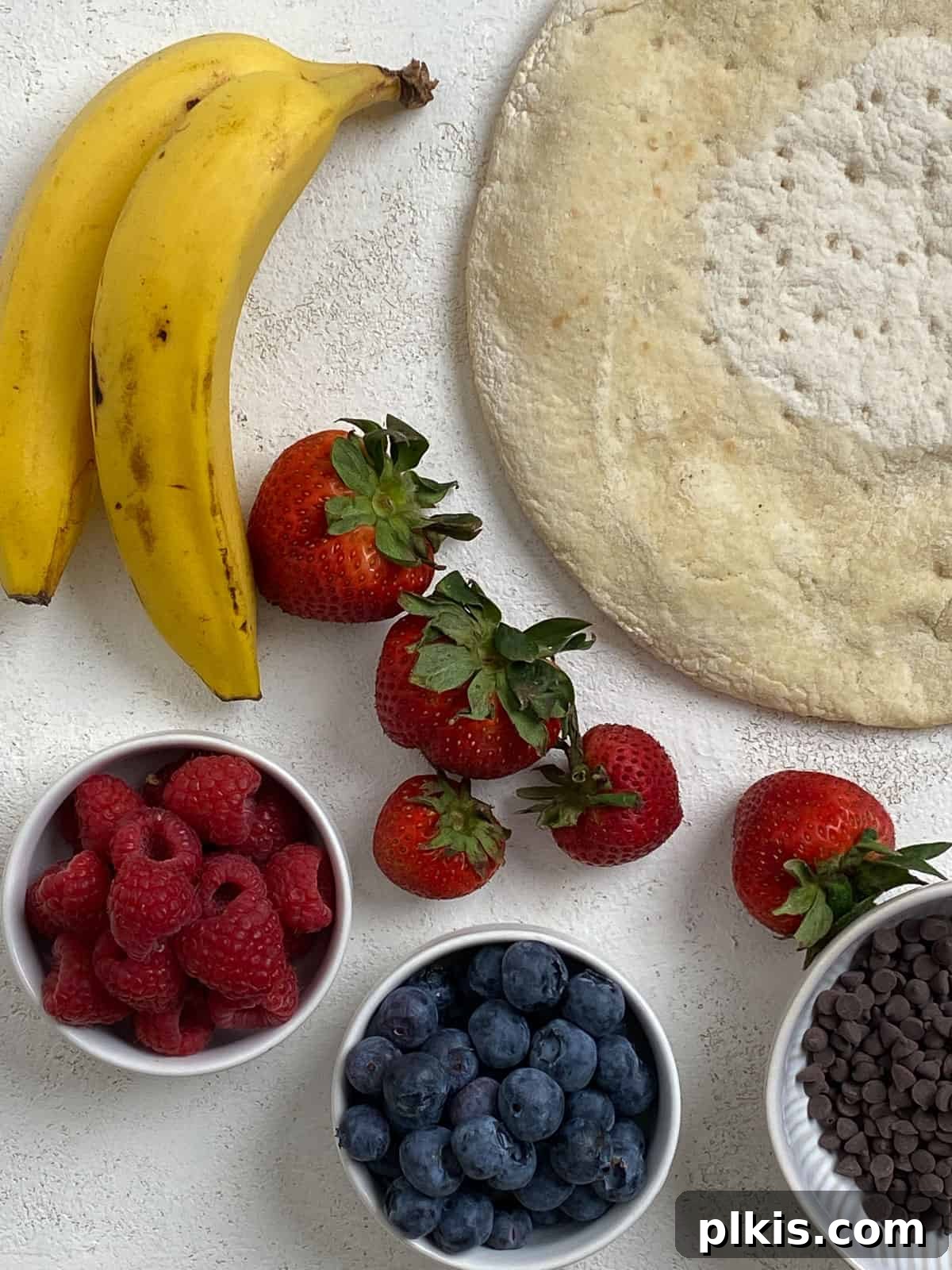 Sunshine Fruit Pizza 3 ingredients for fruit pizza against a white background