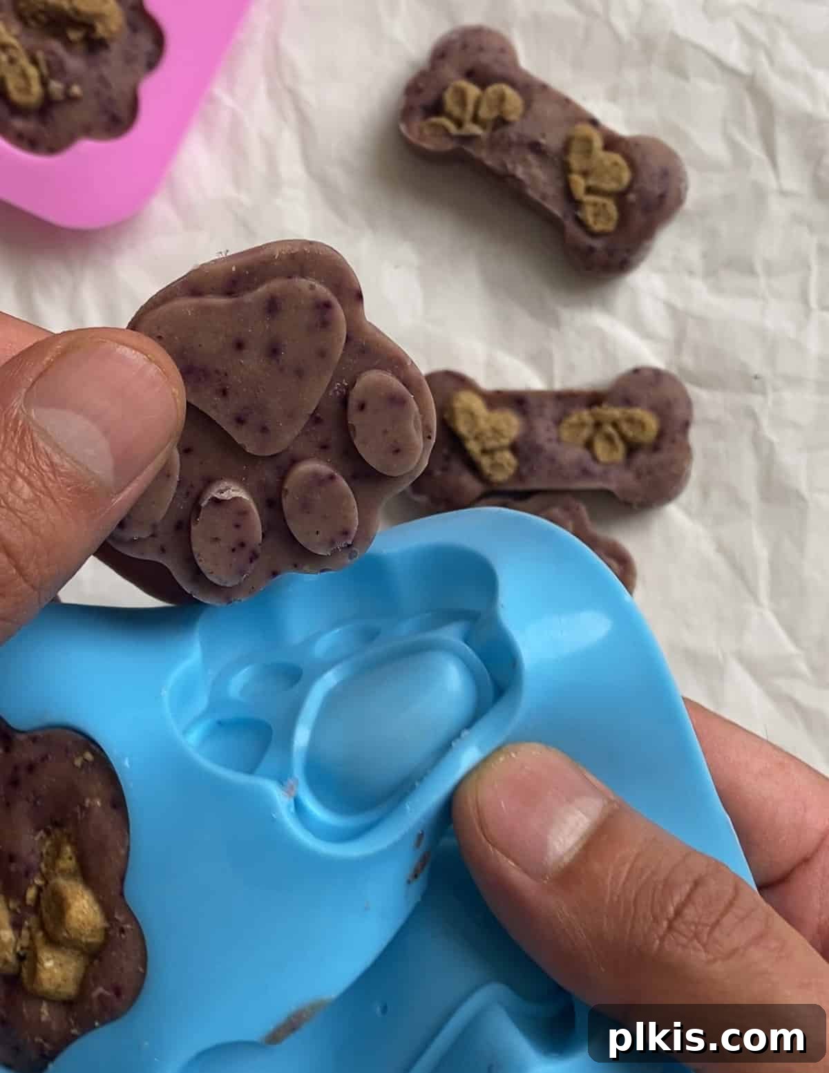 Frosty Peanut Butter Banana Puppy Snacks 14 Successfully removed frozen dog treats, showcasing their perfect shape