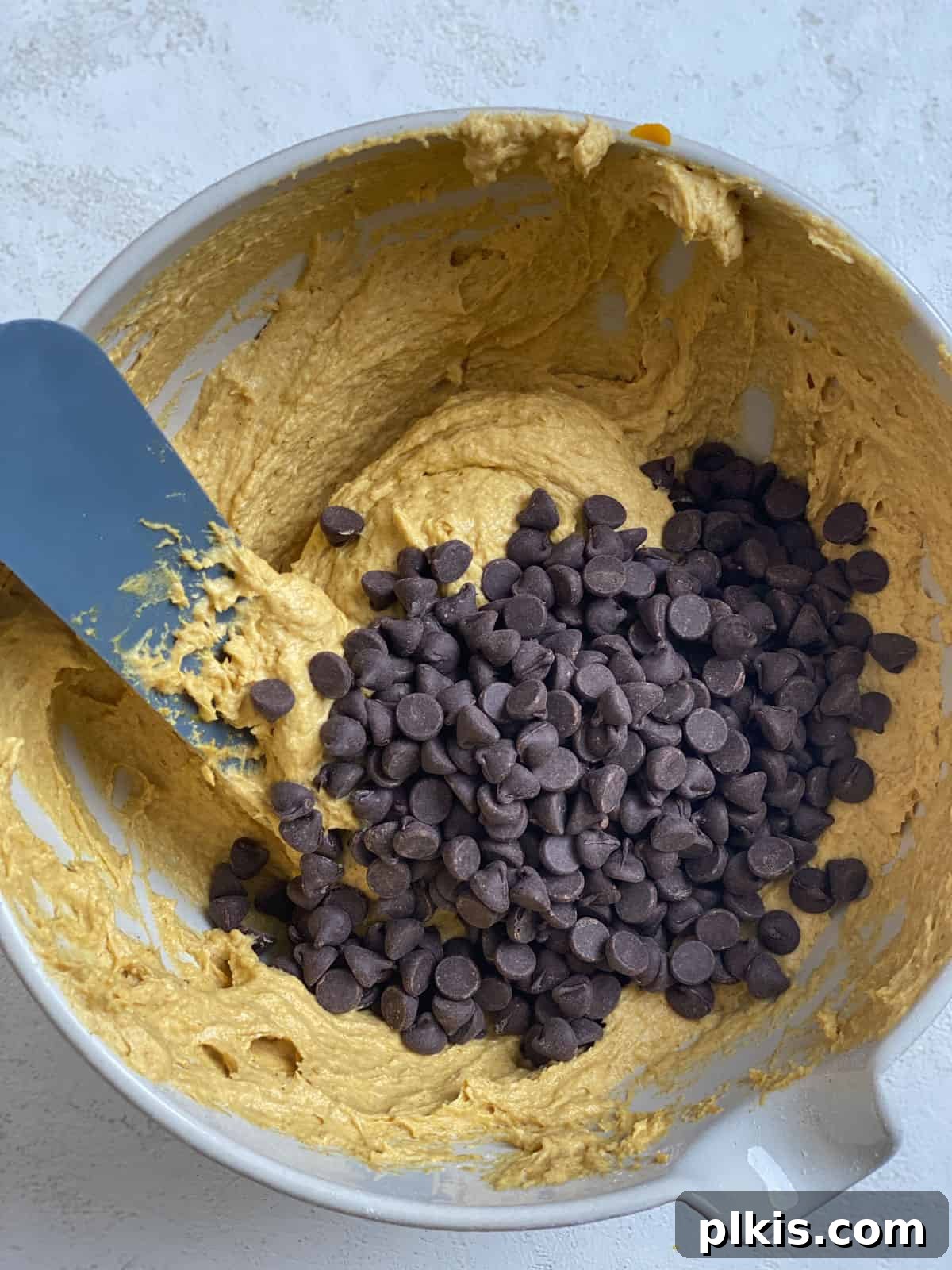 Harvest Spice Vegan Pumpkin Chocolate Chip Cookies 5 Folding vegan chocolate chips into pumpkin cookie dough