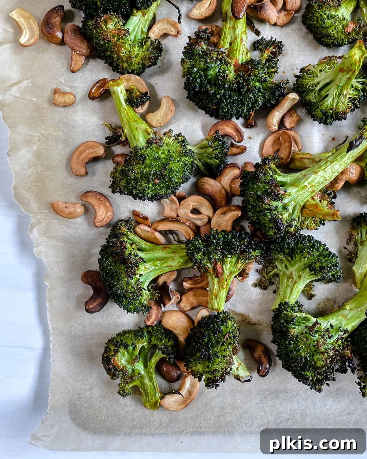 Golden Curry Roasted Broccoli 2 finished Roasted Curried Broccoli on parchment paper