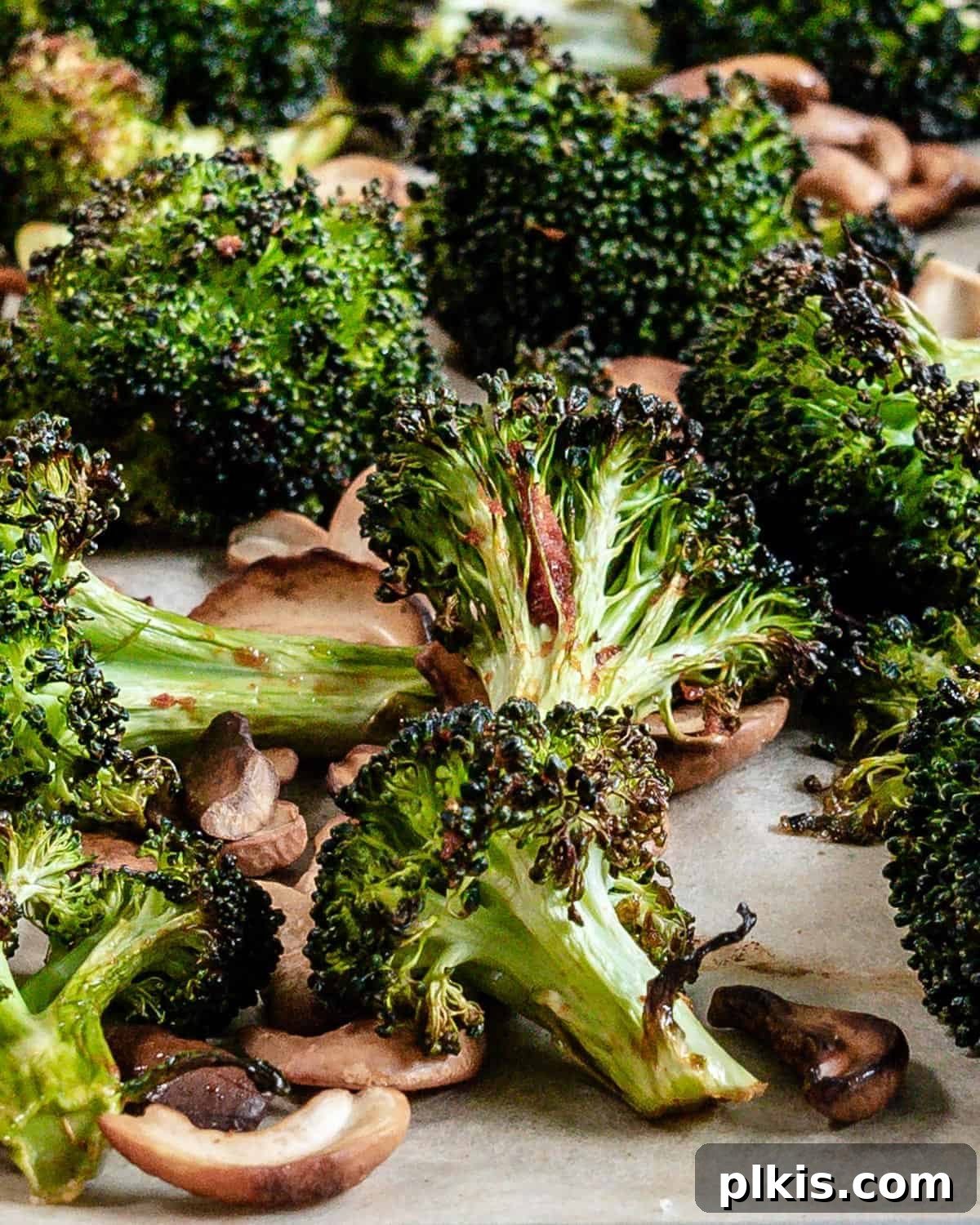 Golden Curry Roasted Broccoli 6 finished Roasted Curried Broccoli on parchment paper